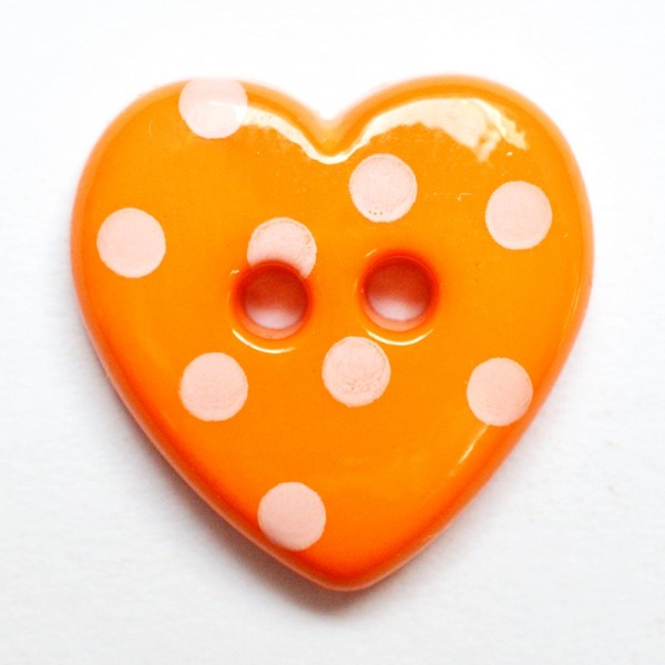 Knopf Herz mit weißen Punkten, orange